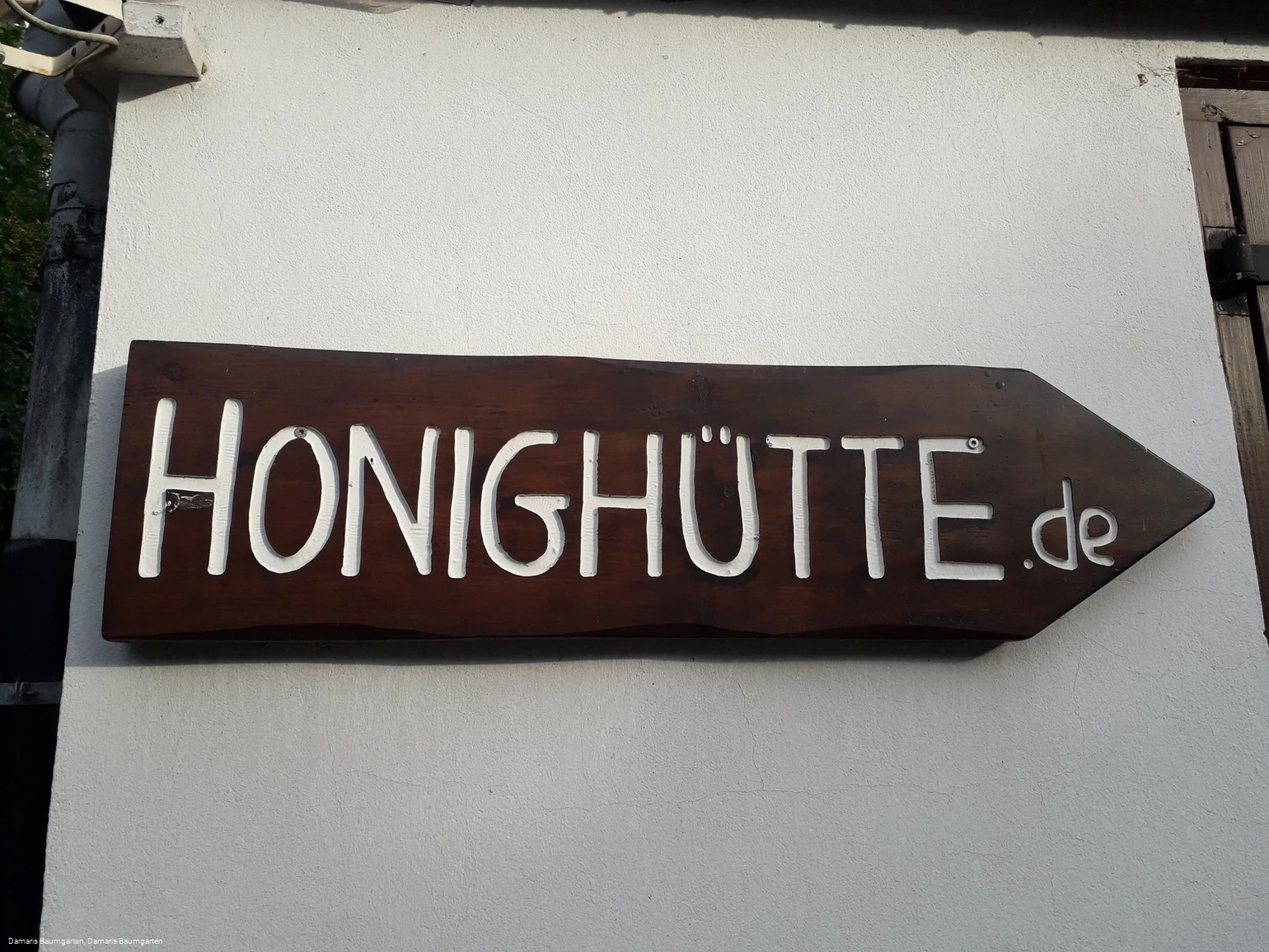 Wegweiser zur Honighütte